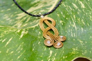 "Tres Amores" Interlaced Pendant Necklace in Gold, Black from Abury