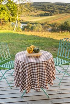 Round linen tablecloth in Mocha Gingham via AmourLinen