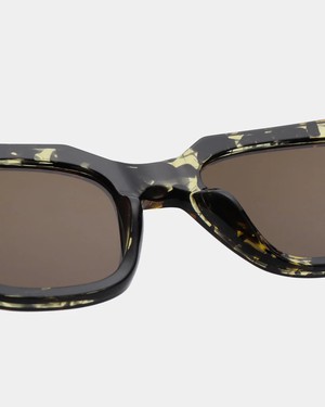 KAWS - Black / Yellow Tortoise Sunglasses by A.Kjaerbede from KOMODO