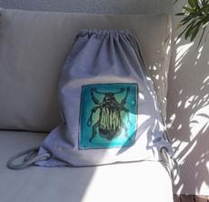 green beetle canvas backpack via madeclothing
