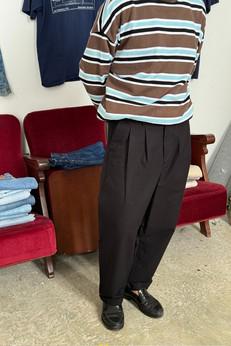 Black chino pants via NWHR