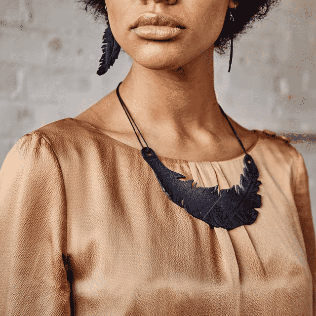 Angel Upcycled Inner Tube Feather Necklace from Paguro Upcycle