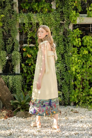 The Tara Midi Dress in Vanilla Custard from Rare & Fair The Tara Midi Dress in Vanilla Custard from Rare & Fair