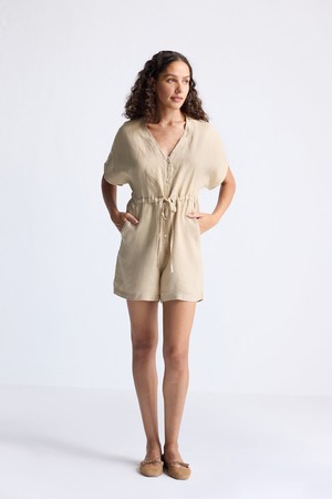 V neck Drawstring Romper in Neutral Beige from Reistor V neck Drawstring Romper in Neutral Beige from Reistor