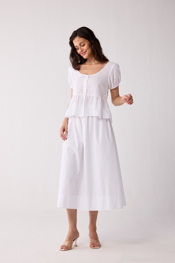 Embroidered Peplum Top with Puff Sleeves in White from Reistor