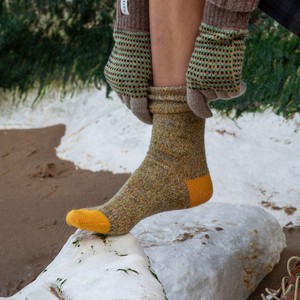 Fine Merino Wool Socks | Dark Yellow Marl from ROVE