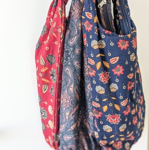 Vibrant crossbody sling handbag with knotted strap from Shakti.ism
