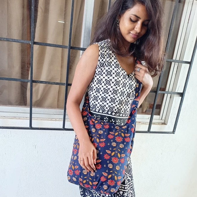 Vibrant crossbody sling handbag with knotted strap from Shakti.ism