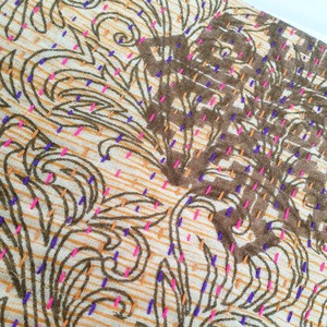 Upcycled sari clutch with kantha stitch from Shakti.ism
