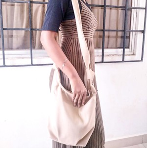 Vibrant crossbody sling handbag with knotted strap from Shakti.ism