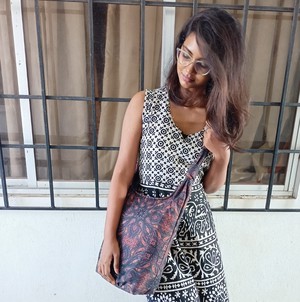 Vibrant crossbody sling handbag with knotted strap from Shakti.ism