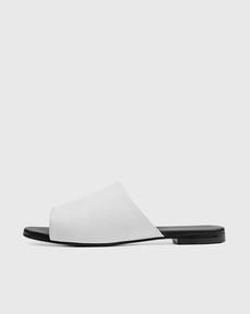 Slides Ritzy White via Shop Like You Give a Damn