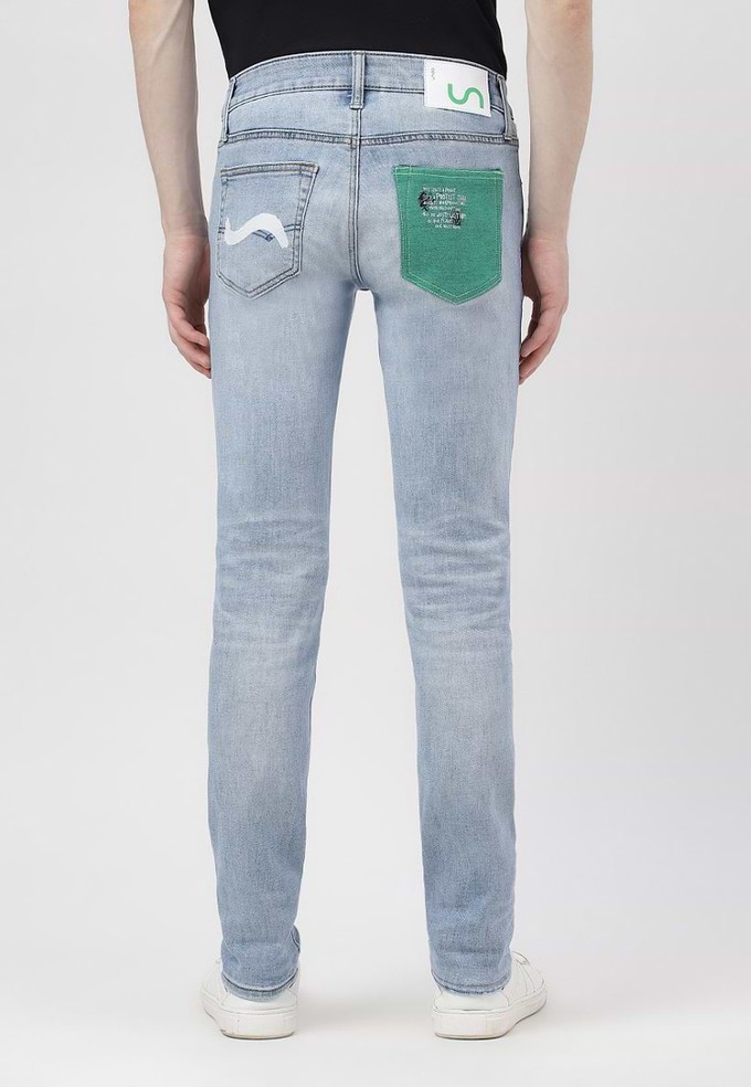 Unüberschüssiges Versprechen | Mid-Indigo Low Rise Skinny Jeans from Un Denim