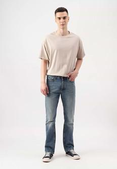 Unüberschüssiges Versprechen | Mittelindigofarbene Bootcut-Jeans mit hohem Bund via Un Denim
